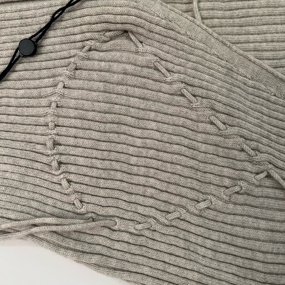 Lauris Long Sleeve Merino Wool Mini Sweater Dress
JACQUEMUS - Picture 5 of 16